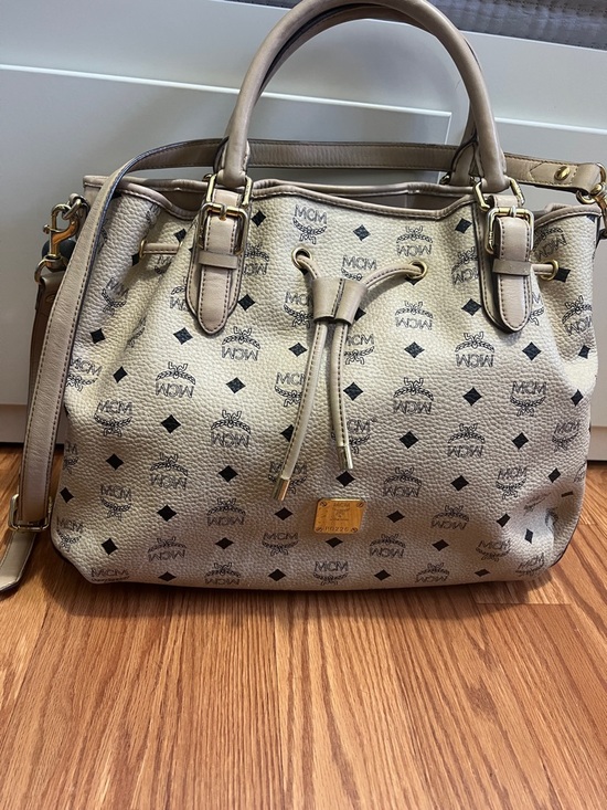 MCM Handbags - MCM Beige Logo Drawstring Tote with Gold Hardware